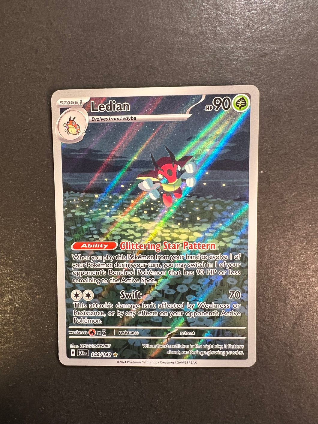 Ledian - 144/142 Holo Ultra Rare - Stellar Crown