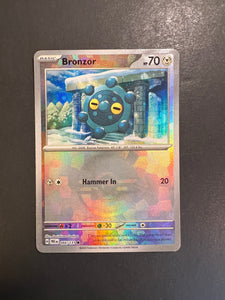 Bronzor - 066/131 Holo Rare Pokeball - Prismatic Evolutions