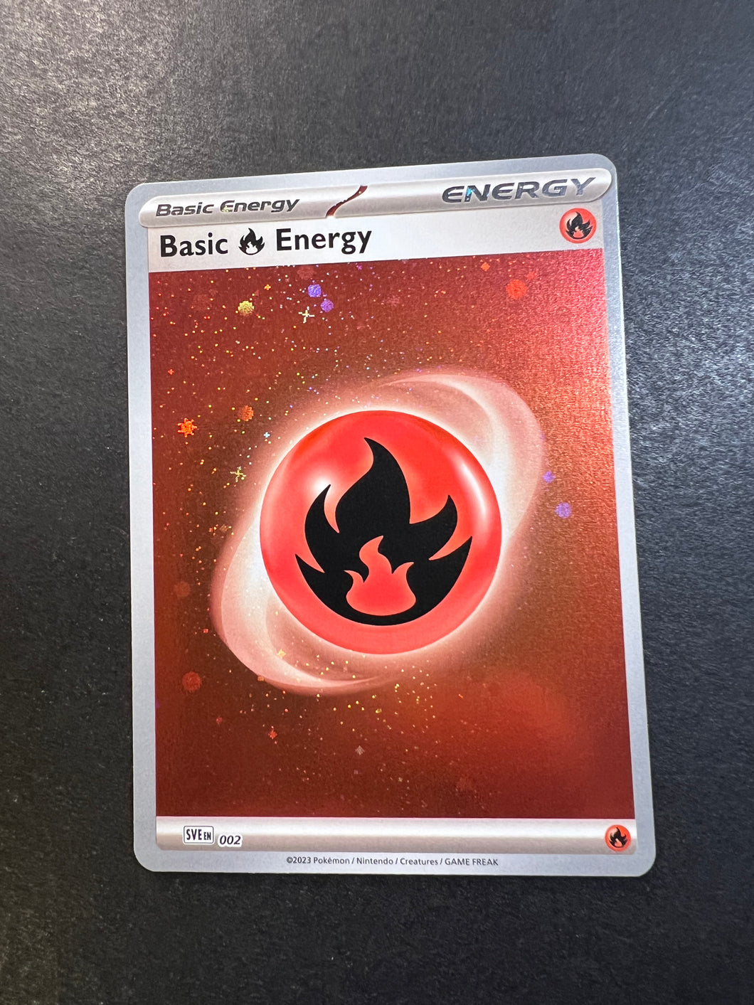 Pokemon TCG Scarlet & Violet SVEEN002 Cosmo Holo Fire Energy Card Pokemon TCG Scarlet & Violet SVEEN002 Cosmo Holo Fire Energy Card