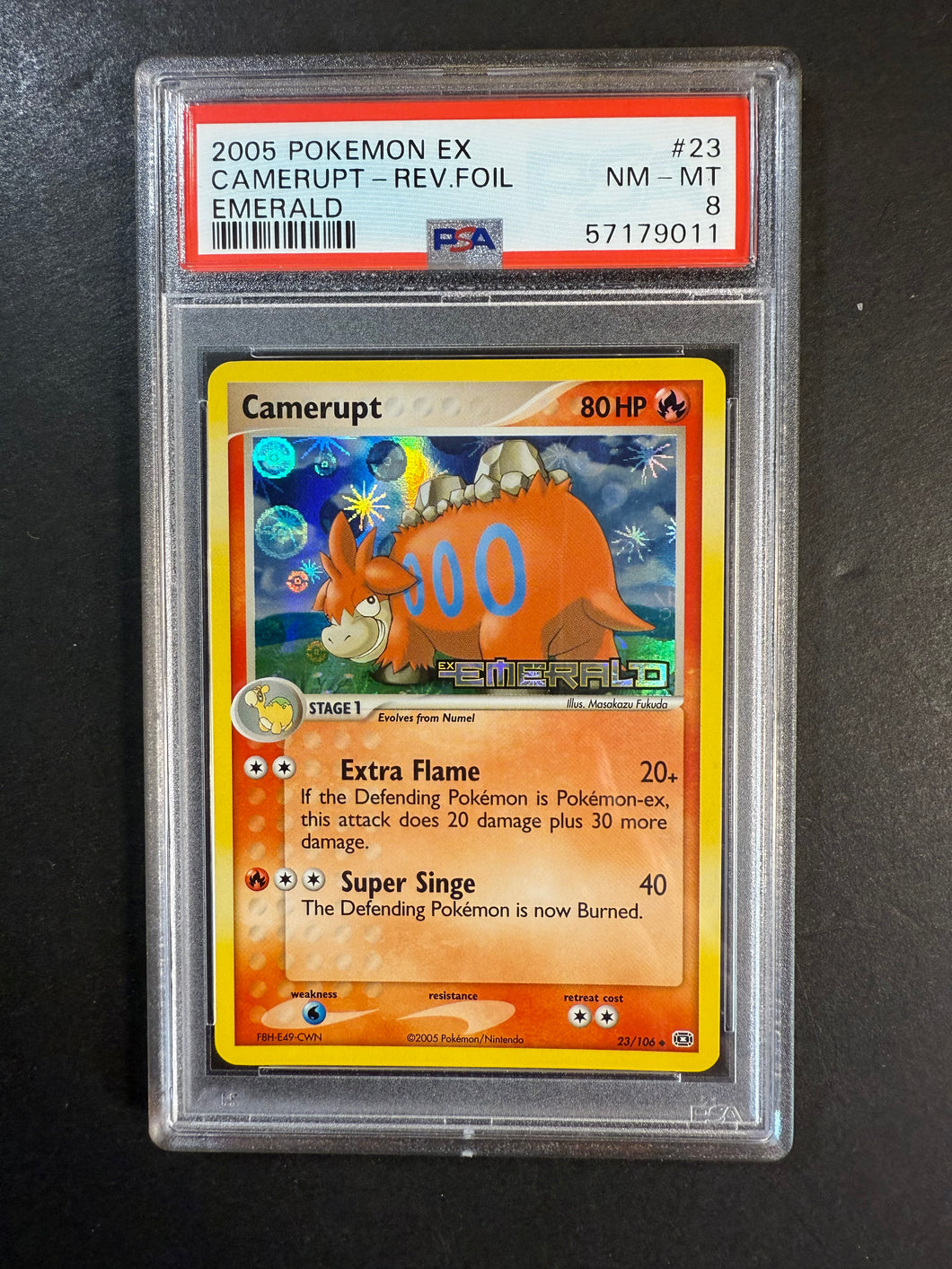 PSA 8 Camerupt - 23/106 “Stamped” Reverse Holo - EX Emerald