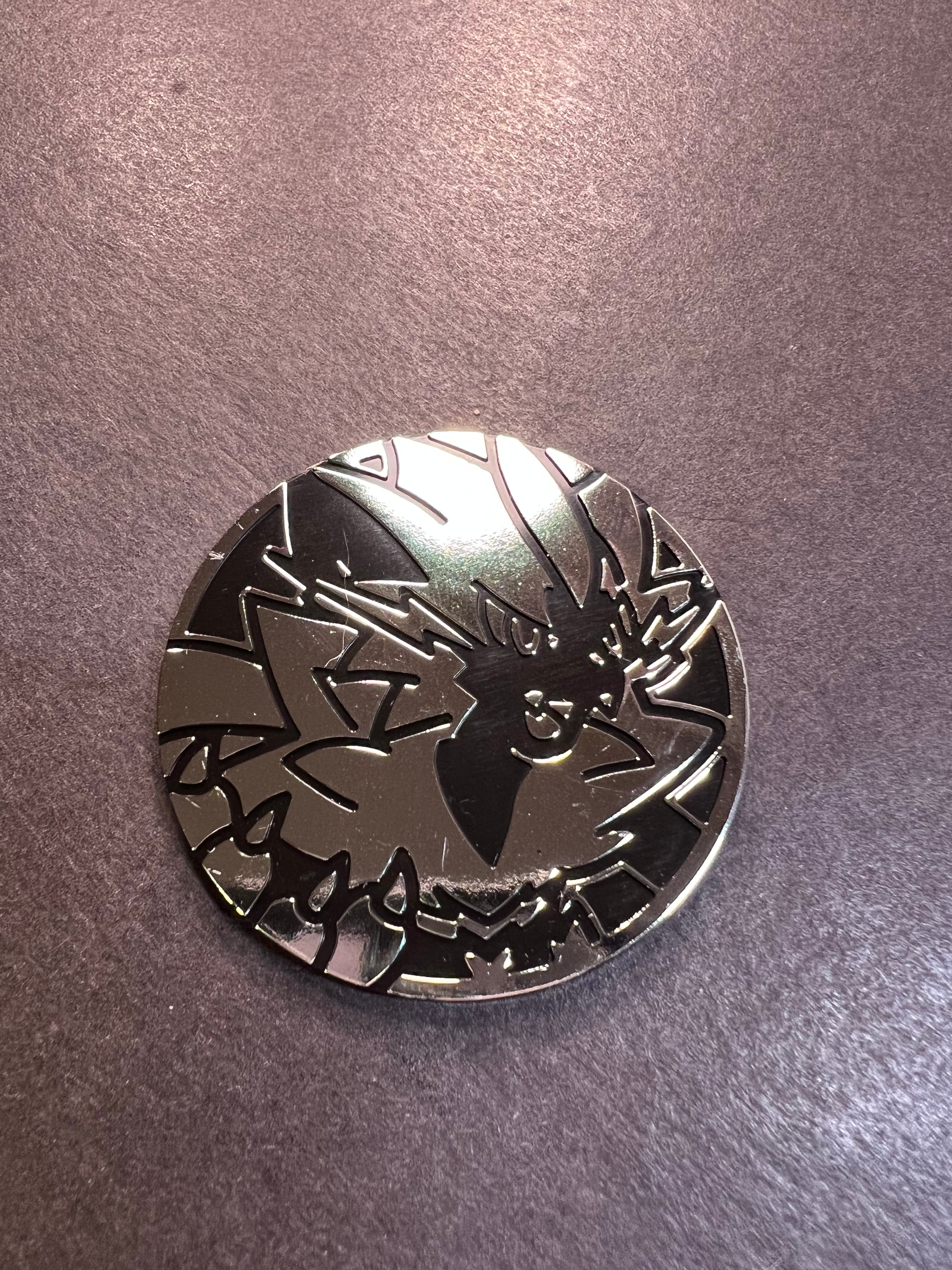 Official Pokemon Jumbo Silver Zeraora Coin – JAB Games13