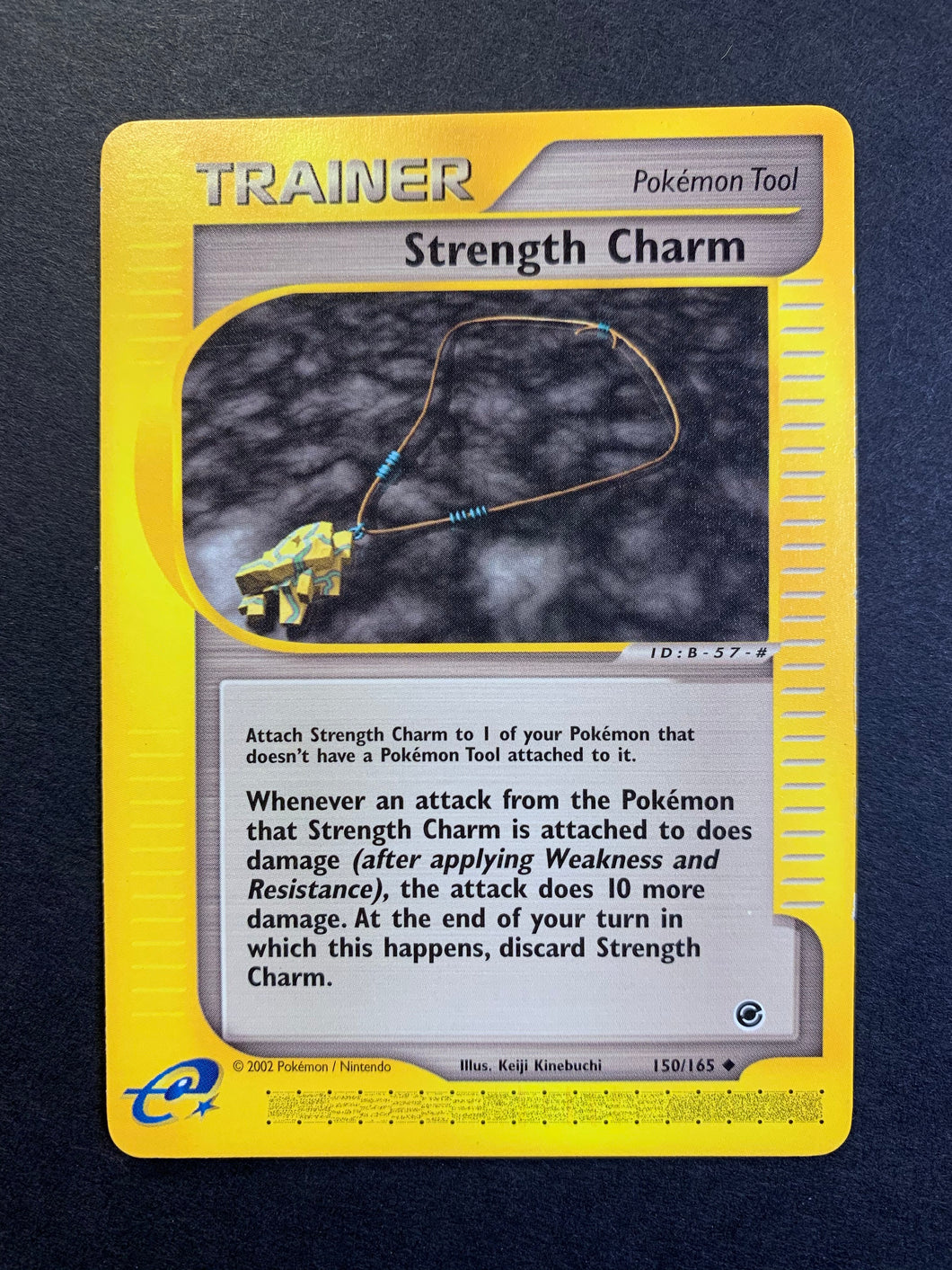 Strength Charm - 150/165 non-Holo Uncommon Trainer