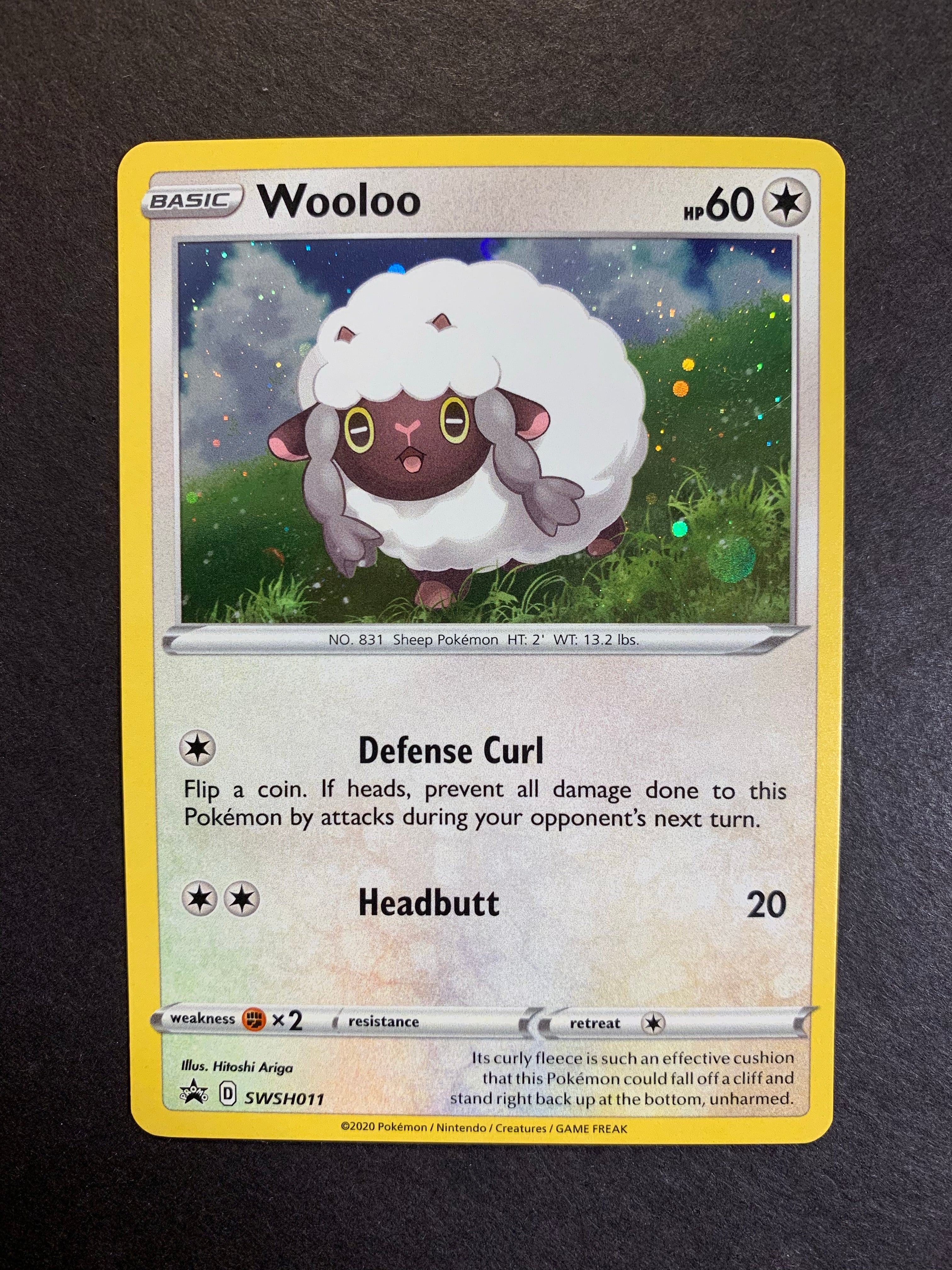 Wooloo - SWSH011 Holo Rare Promo - Sword and Shield Wooloo - SWSH011 Holo Rare Promo - Sword and Shield