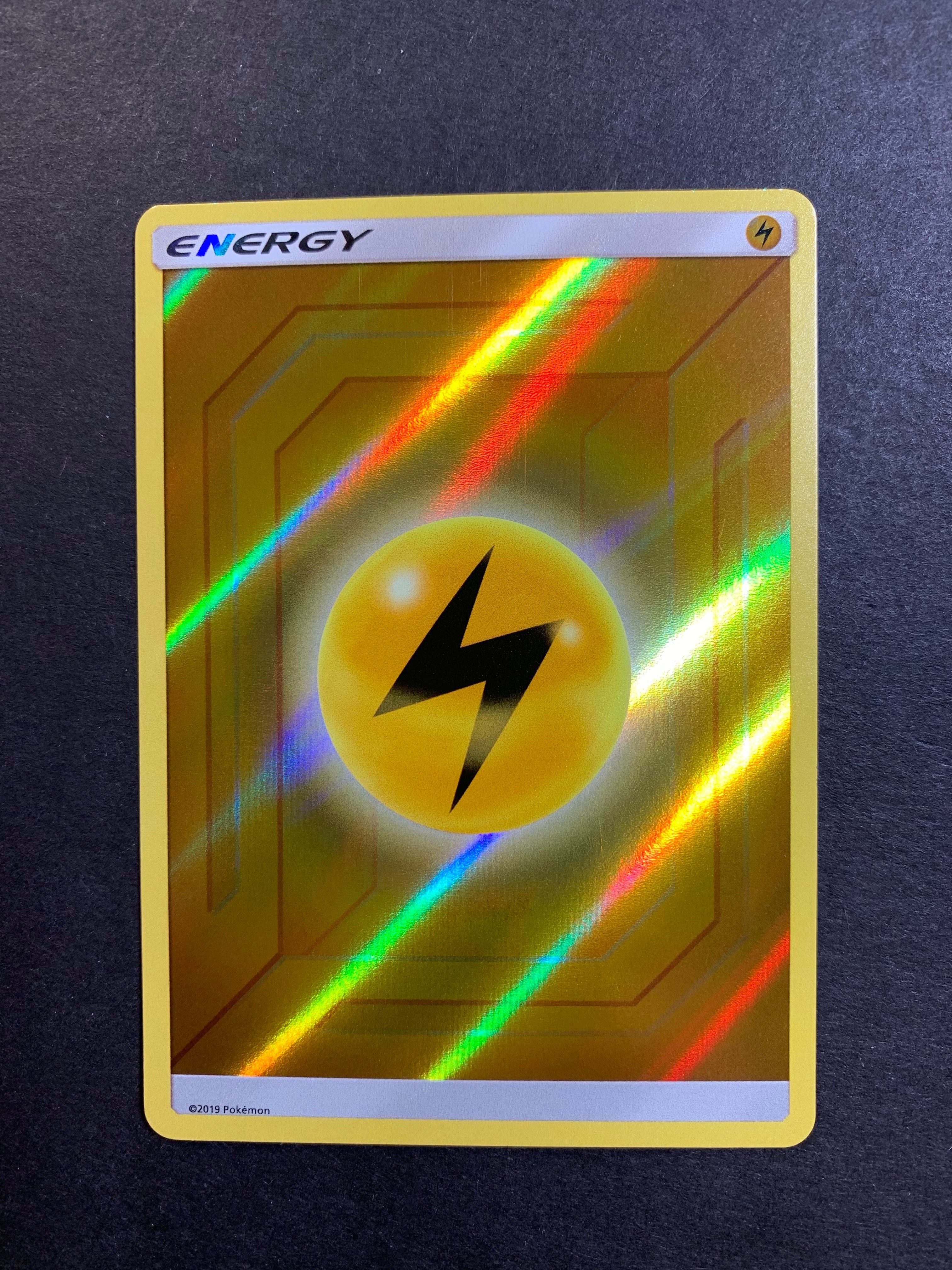 Pokemon TCG Hidden Fates Lightning Energy Rev Holo Card